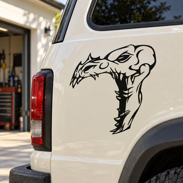 Skull vinyl decal with bold black skull face and flame-like detailing