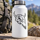 Skull vinyl decal with black skull face graphic on white surface