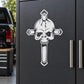 Skull vinyl decal featuring crowned skull with crossed arms design