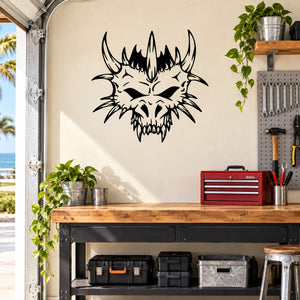 Black skull vinyl wall decal with horned, spiked face design