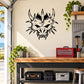 Black skull vinyl wall decal with horned, spiked face design