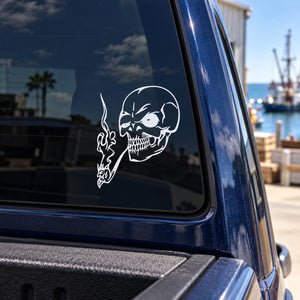 White skull vinyl wall decal with flame and skull hand graphic on window