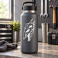 Skull face vinyl decal with sharp horned design in white on dark surface