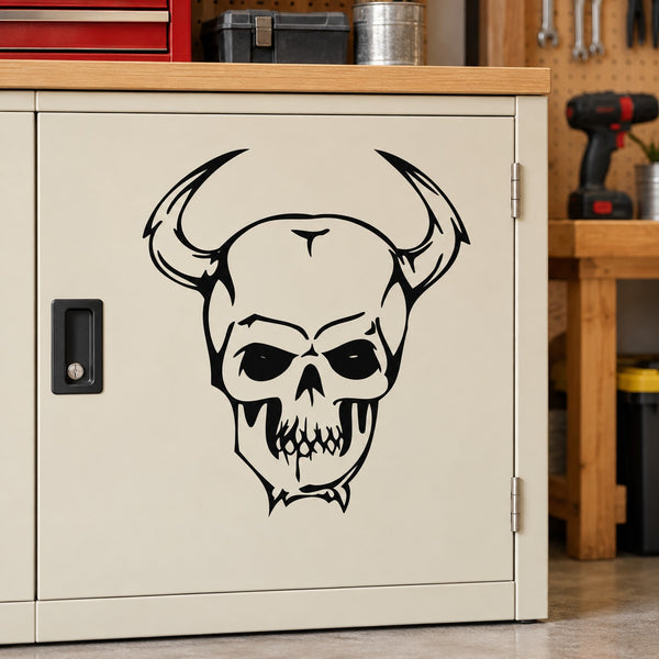 Black skull face vinyl wall decal with hollow eyes and jagged teeth