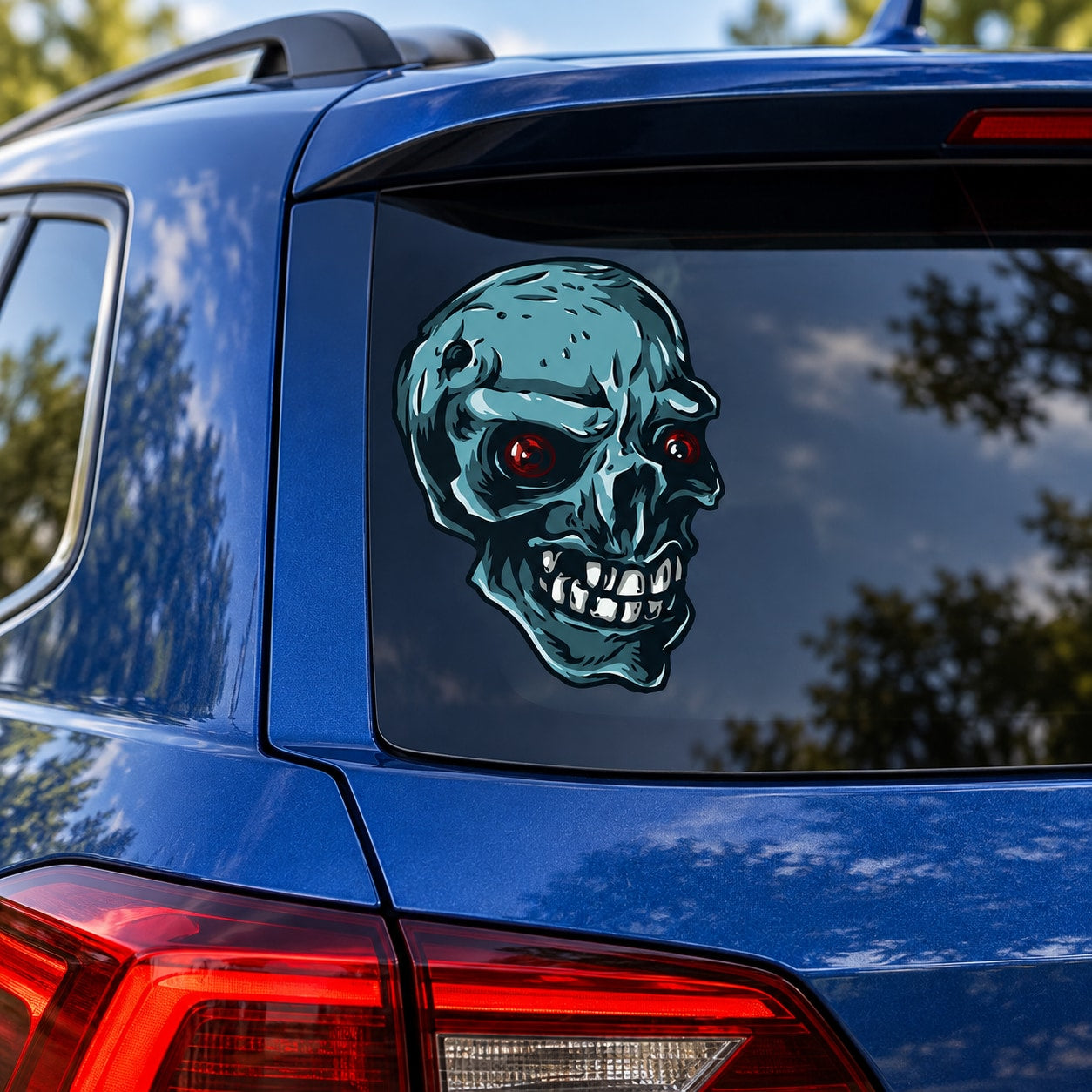 Teal grinning skull sticker decal with red eyes for car window or bumper