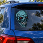 Teal grinning skull sticker decal with red eyes for car window or bumper