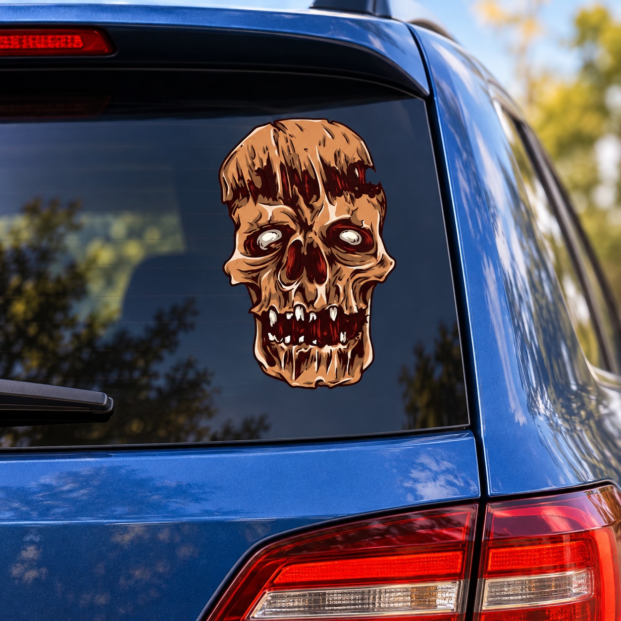 Split-head skull decal sticker, tan and brown with red eyes on a car window