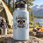 Light blue bottle with black spined skull graphic