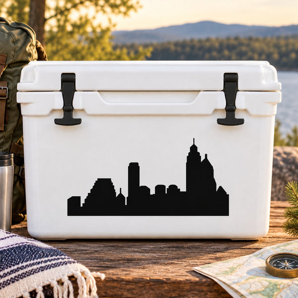 Black city skyline decal with tall buildings silhouette on white cooler