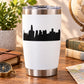 Stainless steel travel tumbler with black city skyline decal on white panel