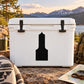 Black building decal featuring a bold doorway silhouette on a light surface
