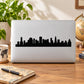 Black city skyline silhouette decal with tall buildings and skyline band
