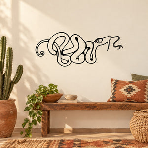 Black tangled snake wall decal with decorative line-art curls and stylized face