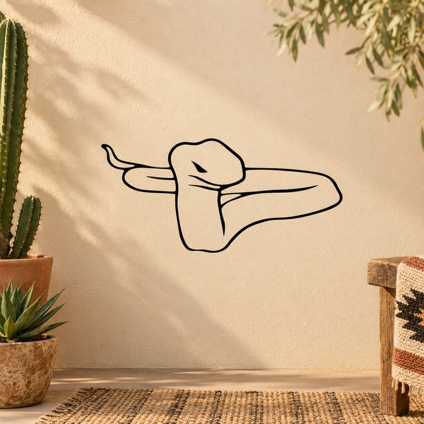Staring snake wall decal with black outline line-art on beige surface