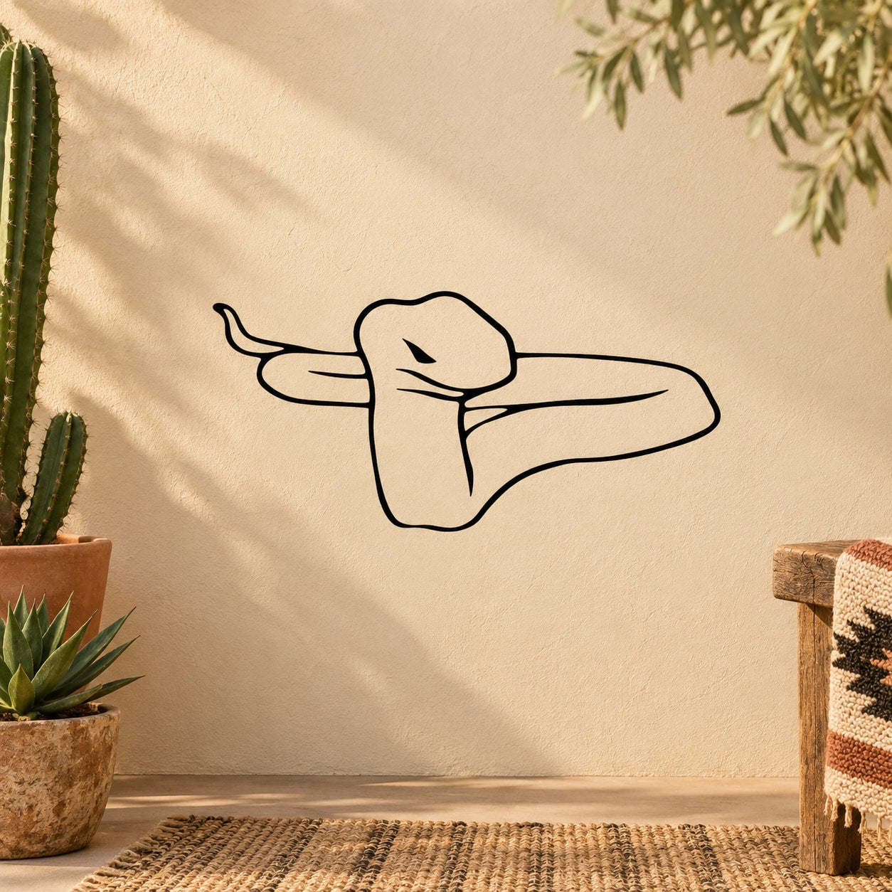 Staring snake wall decal with black outline line-art on beige surface