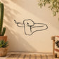 Staring snake wall decal with black outline line-art on beige surface