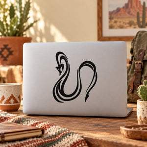 Striped snake decal with black graphic on a white surface