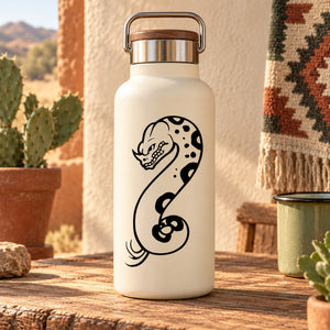 White bottle with black horned nose viper snake decal illustration