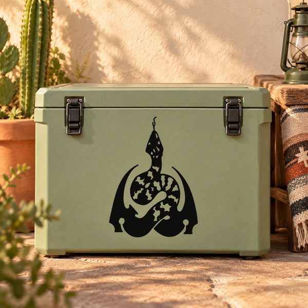 Black double-edged snake decal on green outdoor storage box