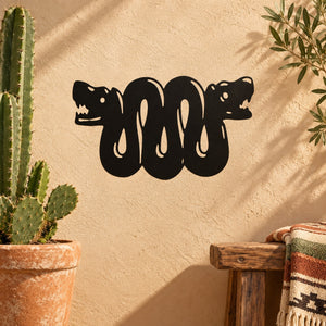 Black double snake heads decal with coiled bodies and drippy tail shapes