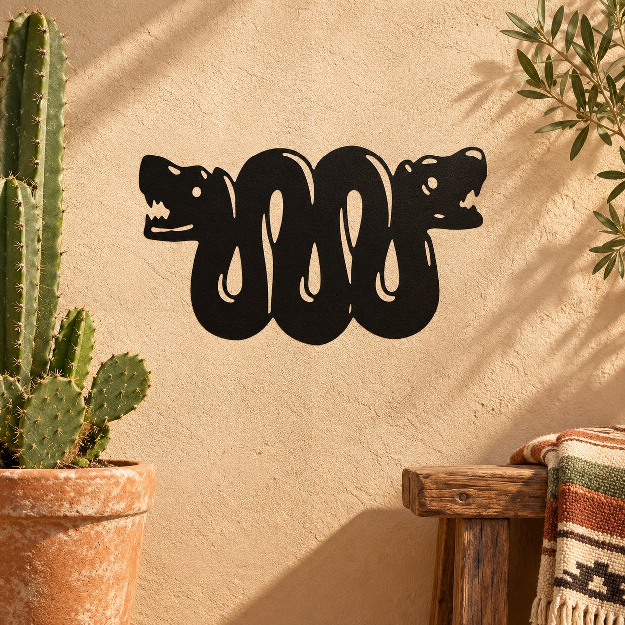Black double snake heads decal with coiled bodies and drippy tail shapes