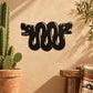 Black double snake heads decal with coiled bodies and drippy tail shapes