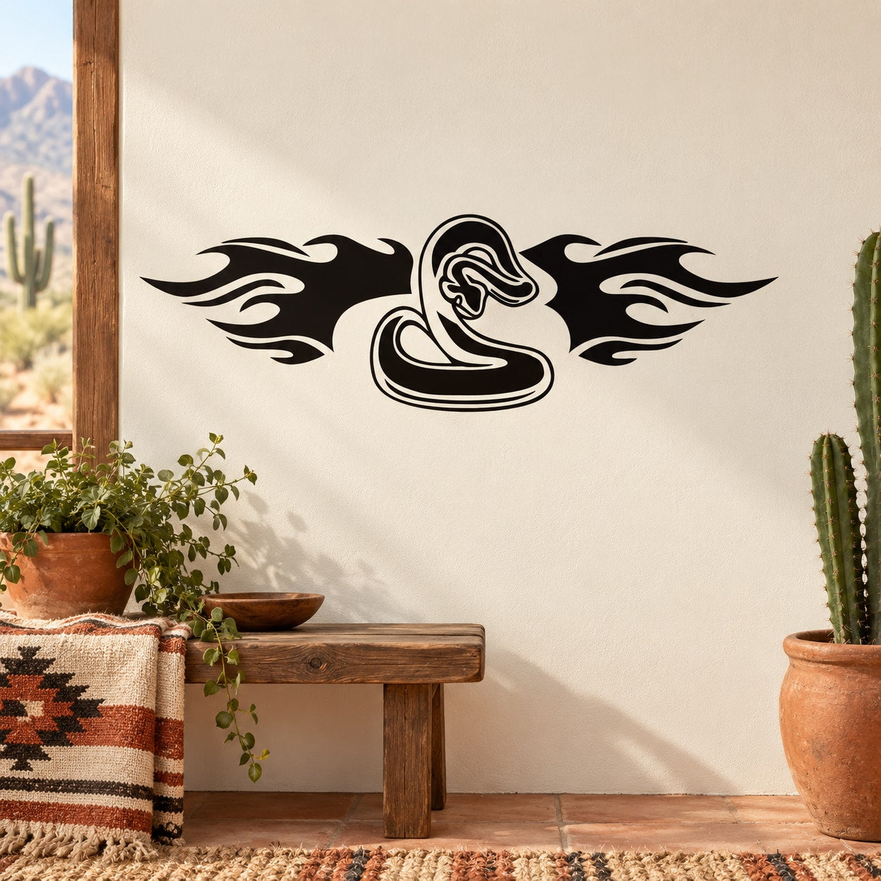 Flaming wings snake decal, black coiled snake emblem on light surface