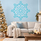 Turquoise snowflake wall decal with intricate starburst pattern
