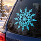 Twelve-pointed snowflake decal with teal-blue snowflake design on car window