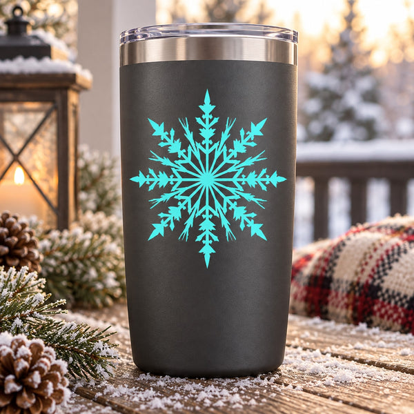 Black tumbler with turquoise snowflake decal, starburst winter design