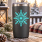 Black tumbler with turquoise snowflake decal, starburst winter design