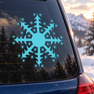 Teal pointed star snowflake decal for car window with sparkling star bursts