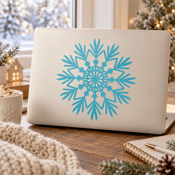 Turquoise snowflake decal on light surface