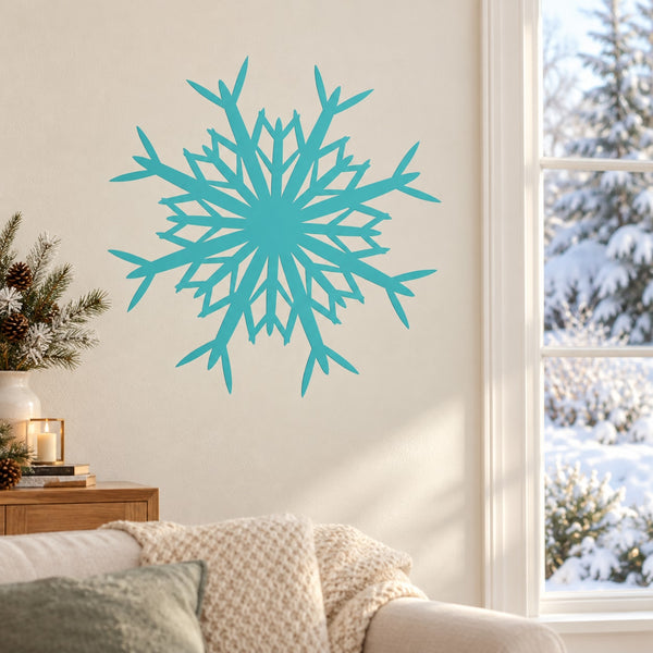 Turquoise snowflake window decal on smooth wall