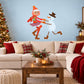 Christmas wall decal of a dancing snowman with a girl in scarf and hat