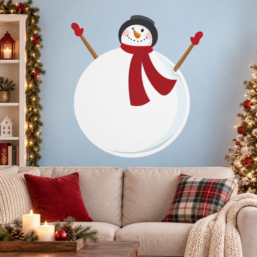Round snowman wall sticker with red scarf, orange nose, and black winter hat