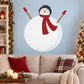 Round snowman wall sticker with red scarf, orange nose, and black winter hat