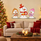 Three singing snowman cartoon stickers, beige and red hats with smiles