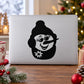 Snowman face decal with ear muffs and scarf, black design on light surface