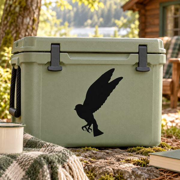 Black owl fluttering silhouette decal on light green cooler lid
