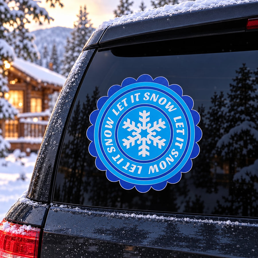 Let It Snow circular car sticker in blue with white snowflake and ring text