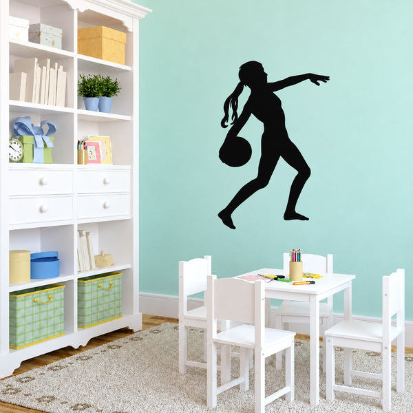 Black soccer player wall decal silhouette holding a ball, vinyl sticker design