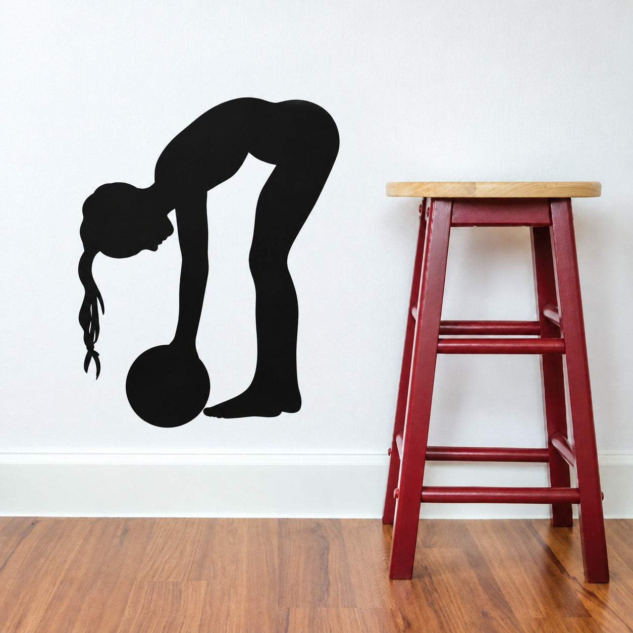 Black soccer player vinyl wall decal with ball silhouette