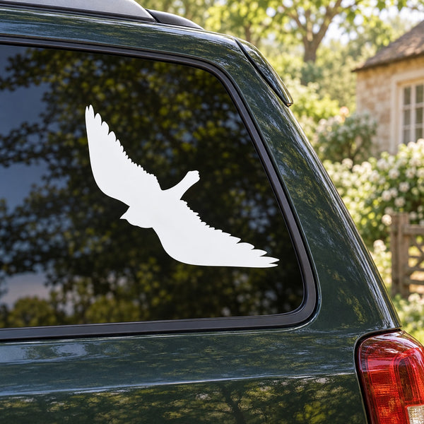 White bird hovering decal on car window
