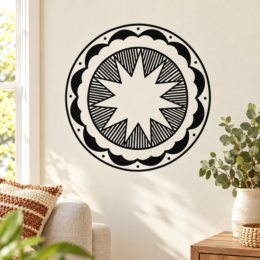 Round wall decal with black-and-white sunburst graphic and scalloped outer ring