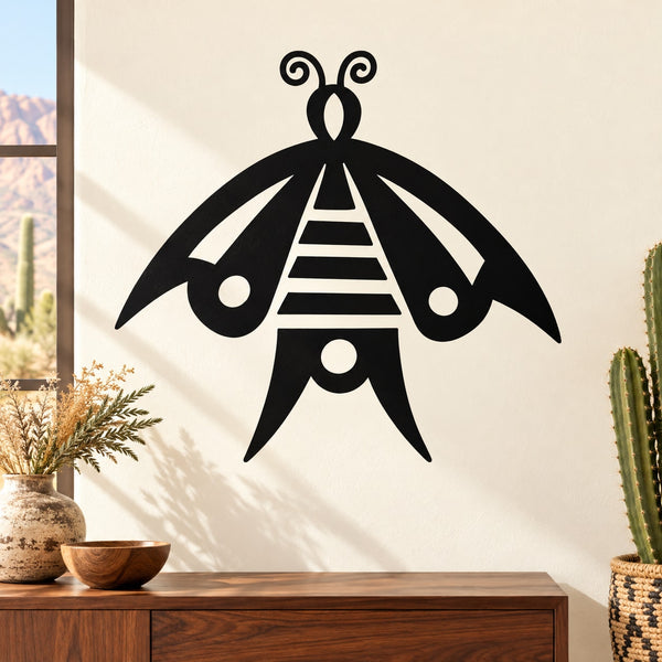 Black native-style butterfly decal with symmetrical tribal patterns and antenna swirls