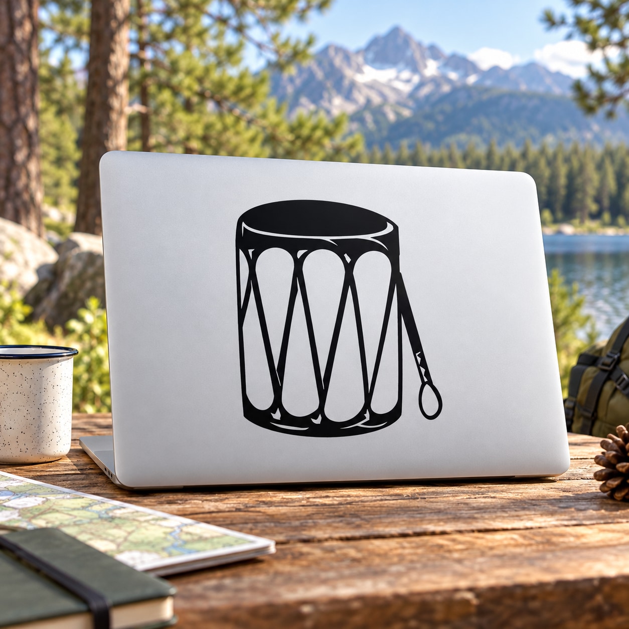 Leather drum decal with black barrel drum graphic and dangling mallet