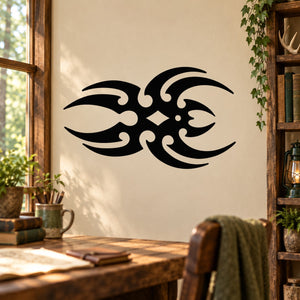 Black stylized spider blade decal with symmetrical swirling lines