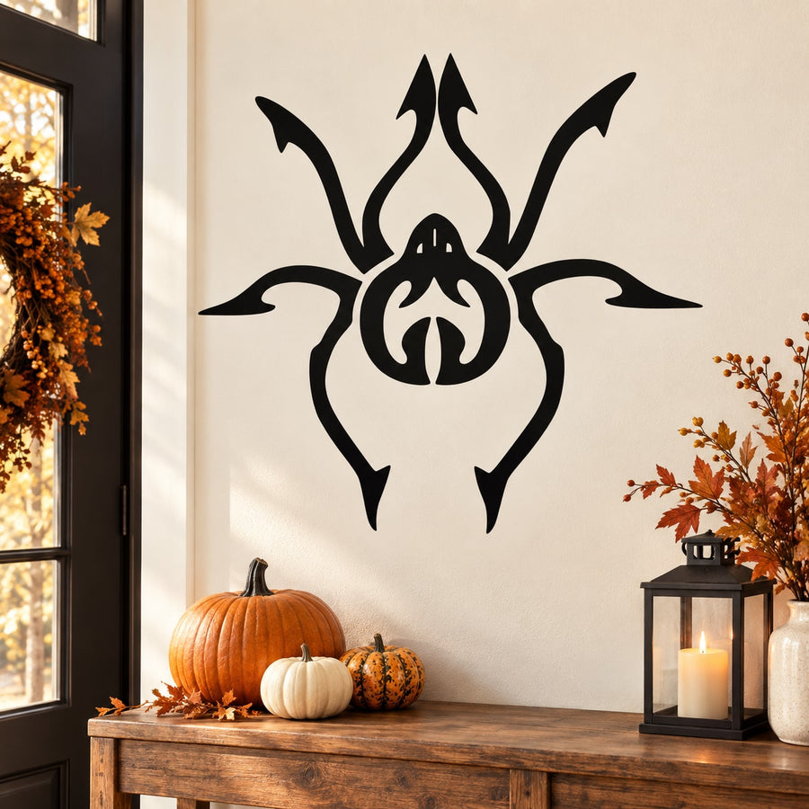 Black spider decal with tentacle legs and stylized skull design