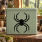 Ball jointed spider decal, black geometric arms with ball joints on light green surface